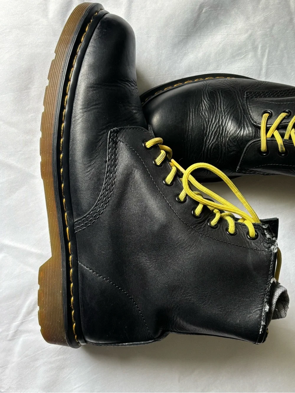Dr. Martens Black Leather Boots with Yellow Laces